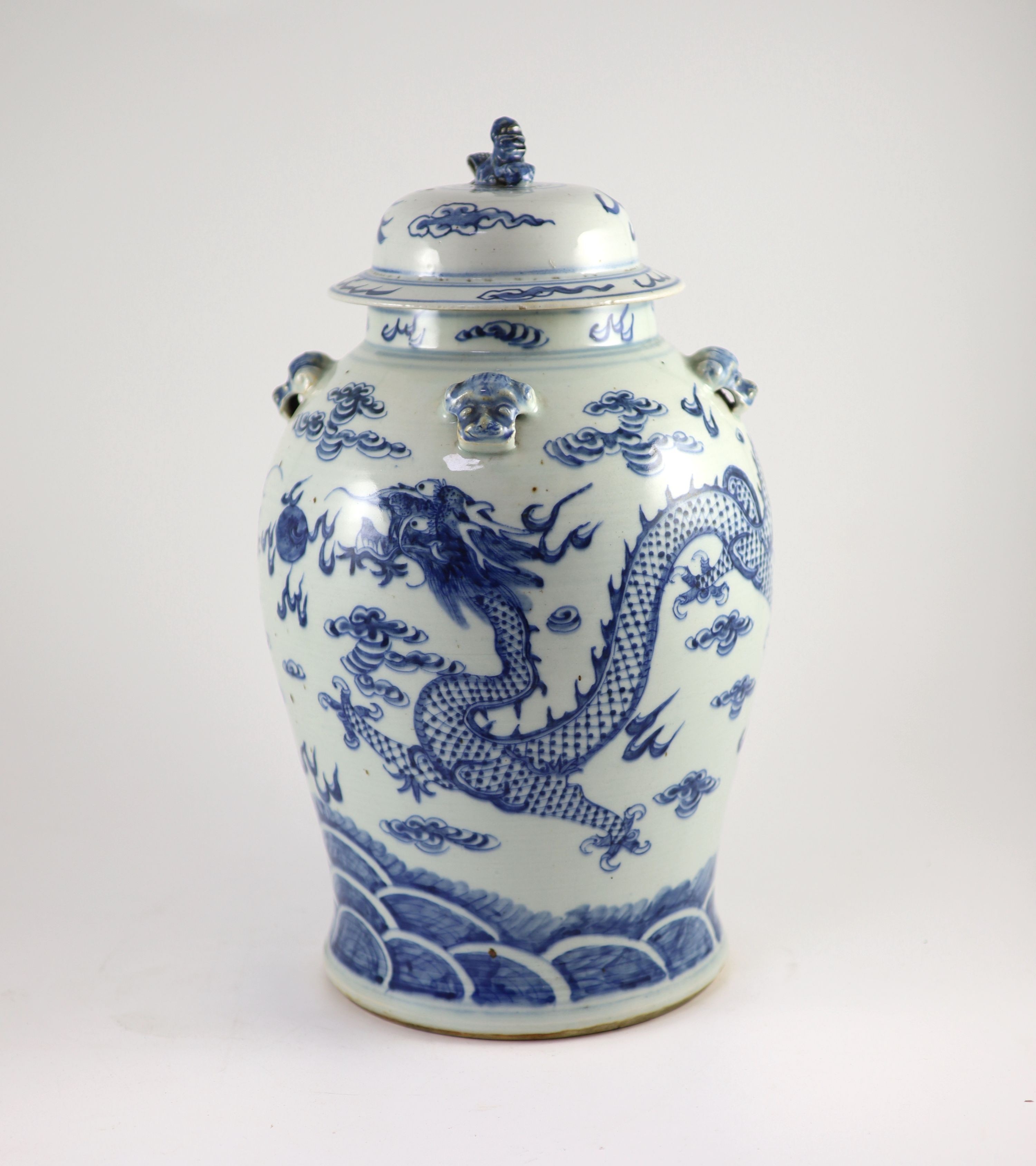 A Chinese blue and white ‘dragon’ vase and cover, Daoguang period (1821-50), 43.5 cm high